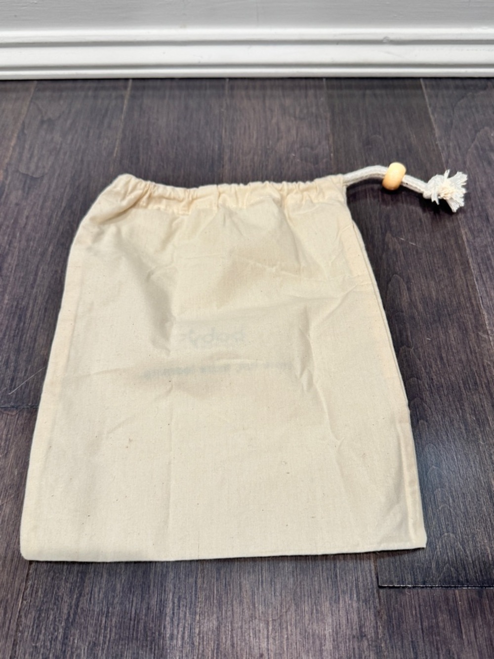 NWOT Baby 10” x 7” Canvas Drawstring Bag in Natural with Green Logo - Picture 4 of 6